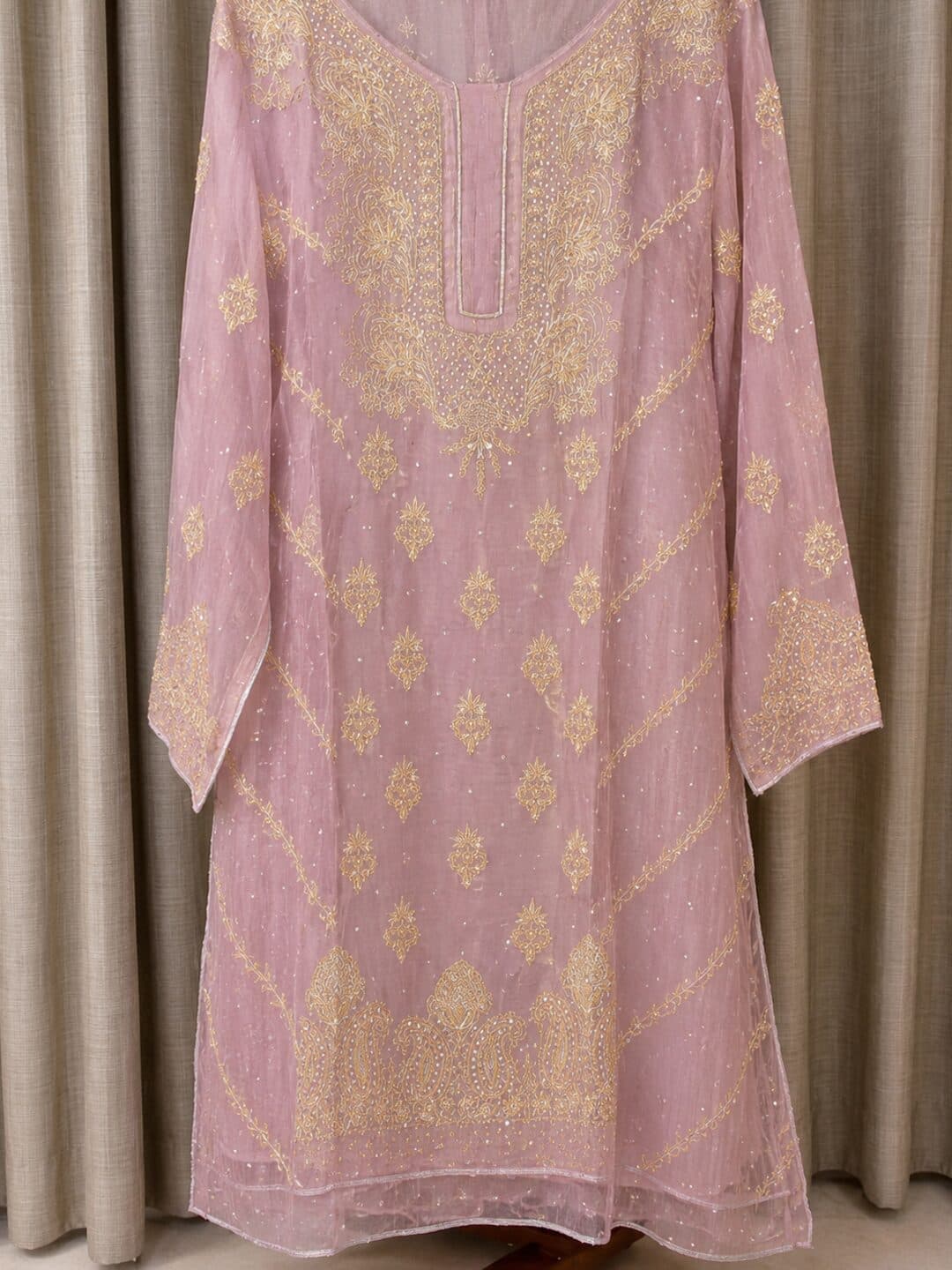 Dusty rose georgette suit with a gold zardozi paisley yoke, diagonal vines and scattered sequins
